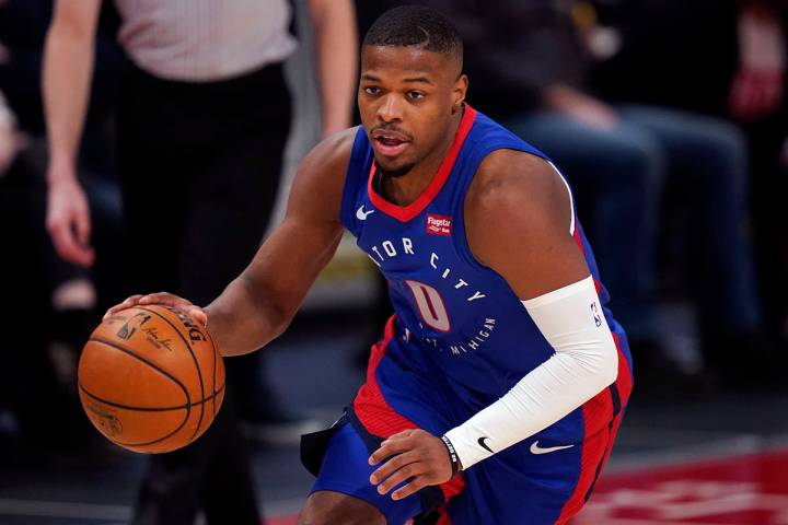 Detroit Pistons guard Dennis Smith Jr. brings the ball up court during the second half of an NB ...