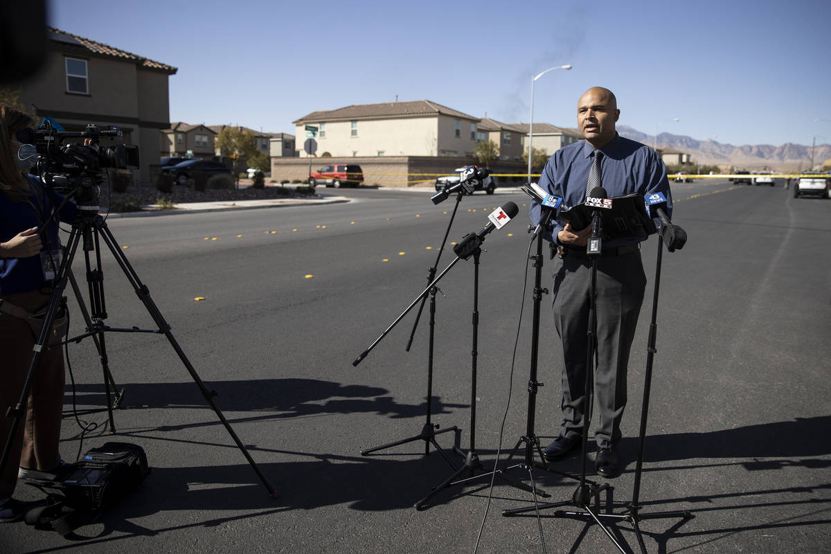 Metropolitan Police Department homicide Lt. Ray Spencer gives a press briefing on an apparent m ...