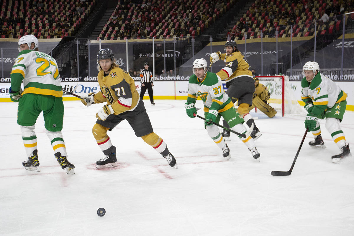 Golden Knights center William Karlsson (71), Minnesota Wild right wing Mats Zuccarello (36) and ...