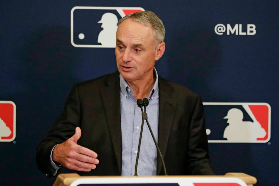FILE - In this Feb. 6, 2020, file photo, Major League Baseball Commissioner Rob Manfred answers ...