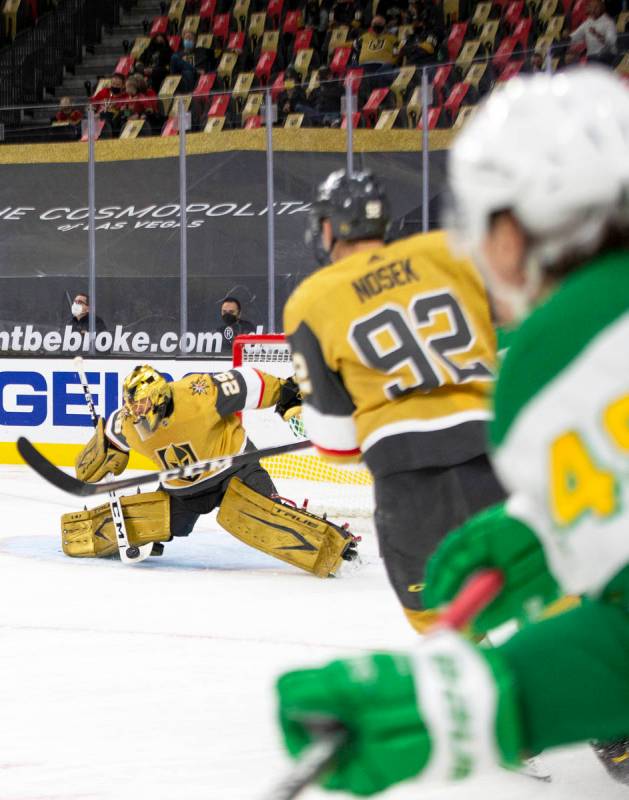 Golden Knights goaltender Marc-Andre Fleury (29) saves a shot on goal by the Minnesota Wild dur ...