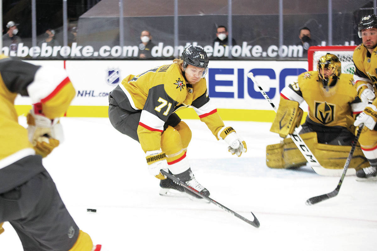 Golden Knights center William Karlsson (71) skates for the puck as Golden Knights goaltender Ma ...