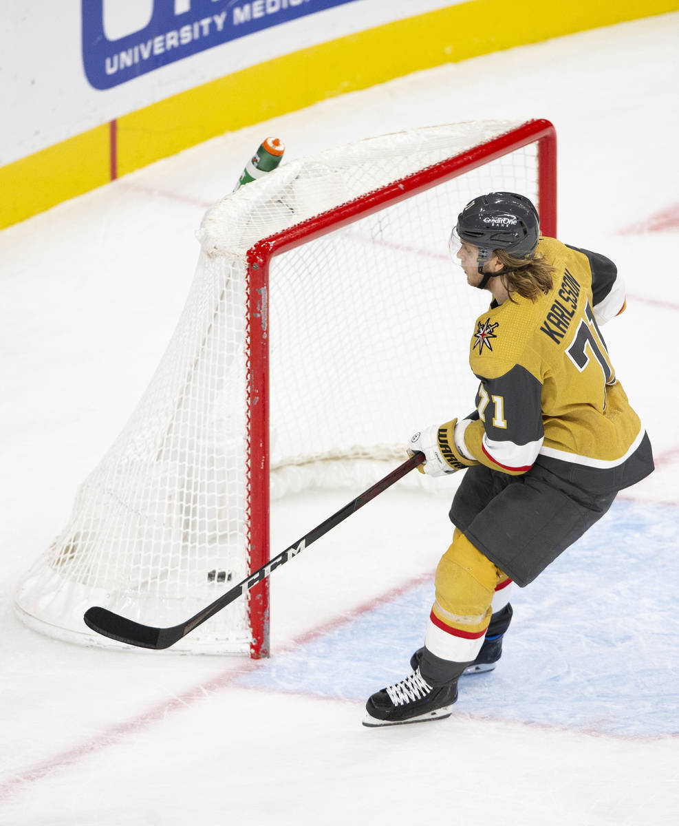 Golden Knights center William Karlsson (71) scores a goal on the Wild's empty net during the th ...