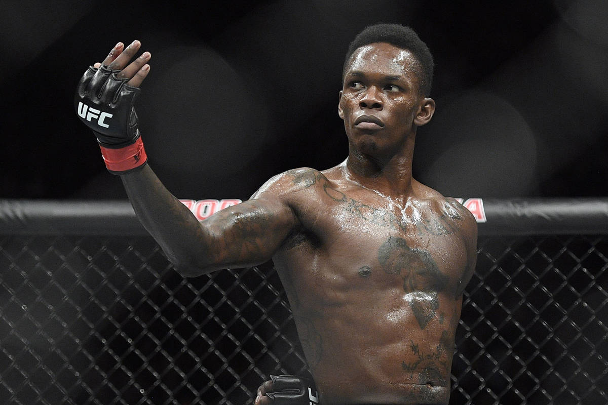 In this Feb. 10, 2019, file photo, Nigeria's Israel Adesanya poses as he fights Brazil's Anders ...