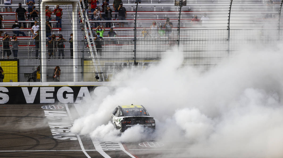 AJ Allmendinger does a burnout after winning a NASCAR Xfinity Series auto race at the Las Vegas ...