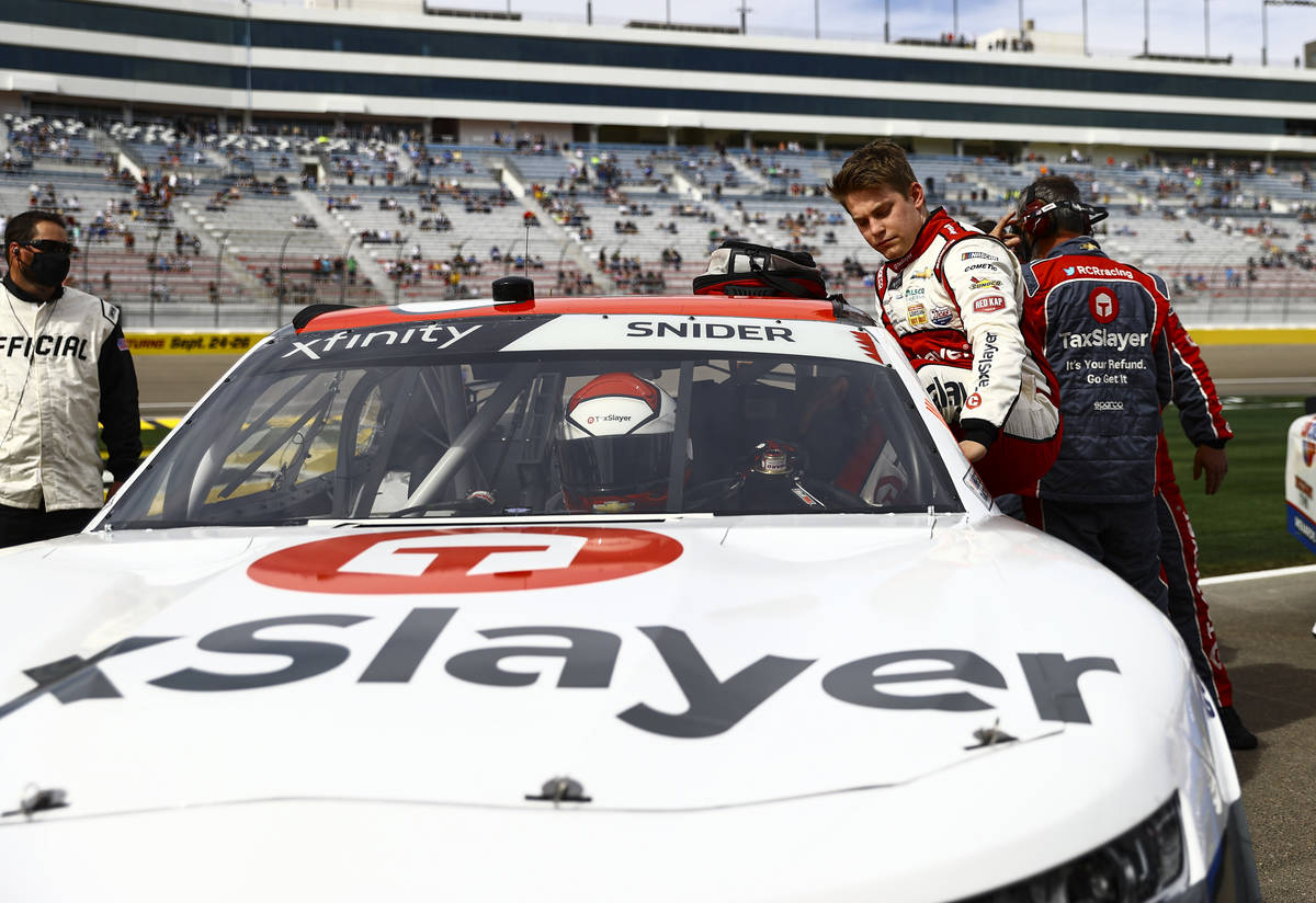 Myatt Snider gets into his car before competing in a NASCAR Xfinity Series auto race at the Las ...