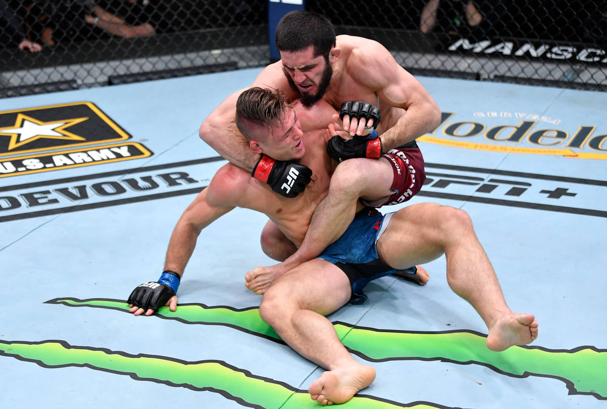 LAS VEGAS, NEVADA - MARCH 06: (R-L) Islam Makhachev works for a submission against Drew Dober i ...
