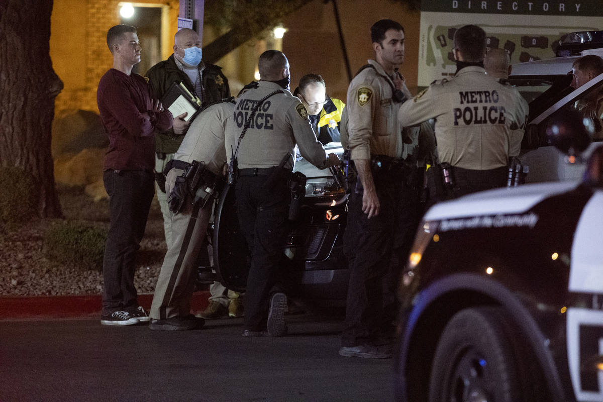 Las Vegas police investigate the scene of a homicide at the 3600 Block of Paradise Road in Las ...