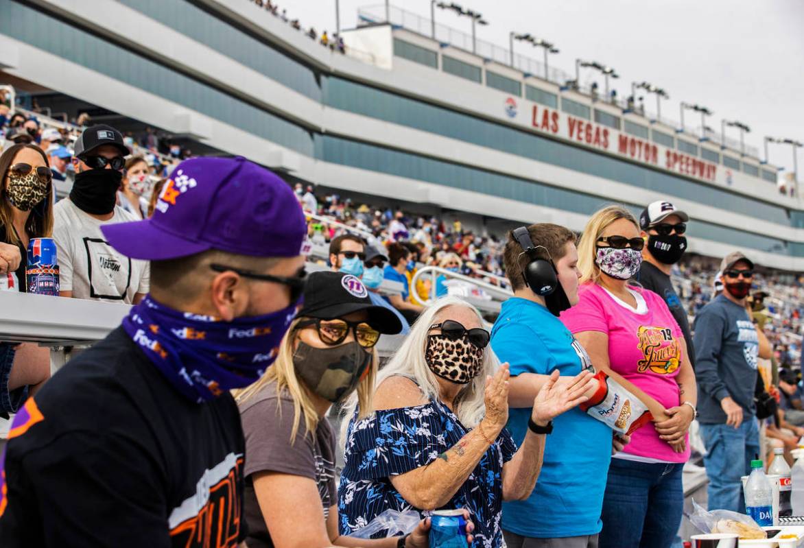 Fans enjoy the NASCAR Cup Series Pennzoil 400 auto race from the grandstands at Las Vegas Motor ...