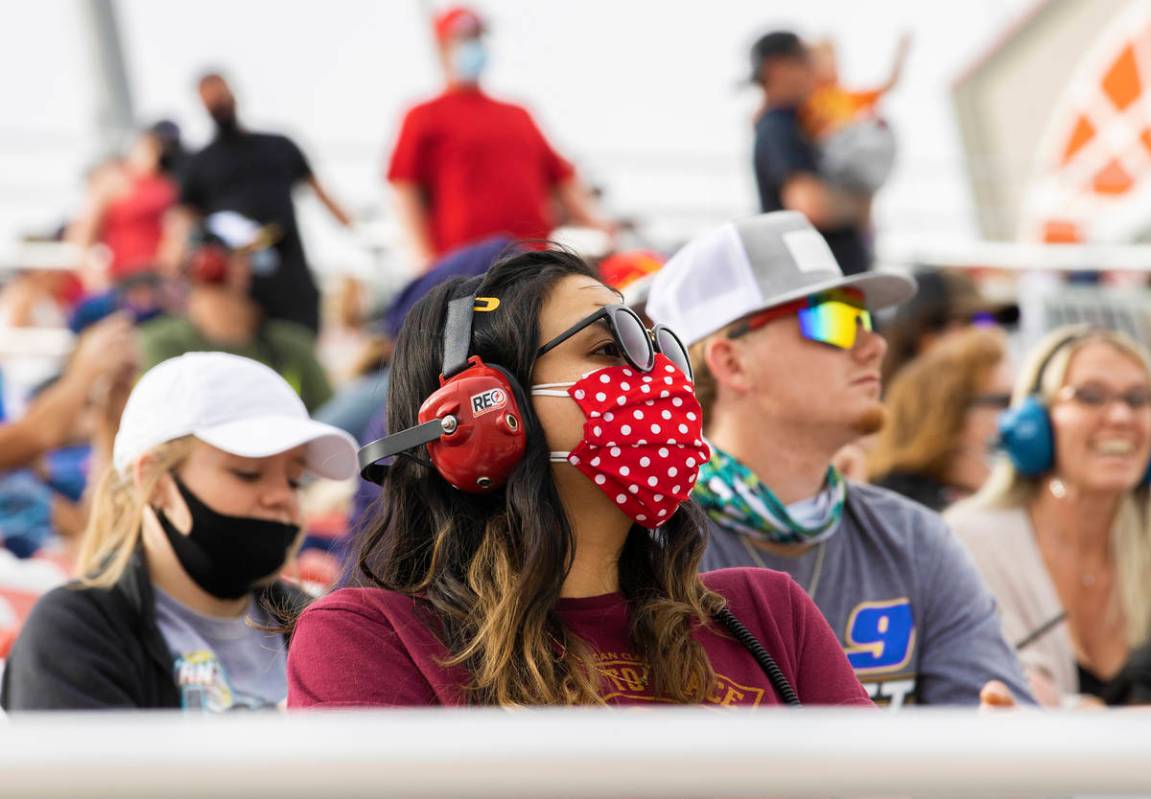 Fans enjoy the NASCAR Cup Series Pennzoil 400 auto race from the grandstands at Las Vegas Motor ...