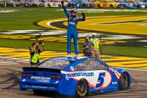 NASCAR Cup Series driver Kyle Larson (5) celebrates after winning the NASCAR Cup Series Pennzoi ...