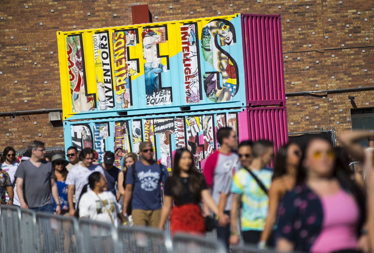 Attendees arrive for day 2 of the Life is Beautiful festival in downtown Las Vegas on Saturday, ...