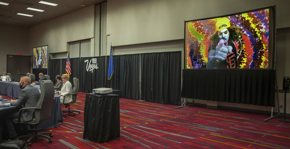 Carrot Top speaks in a promotion spot on the screen during an LVCVA meeting within the Las Vega ...
