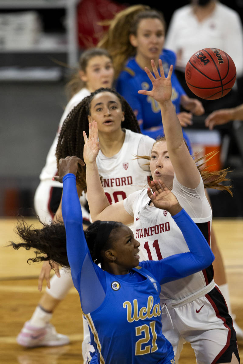 Stanford Cardinal forward Ashten Prechtel (11) blocks an attempted point by UCLA Bruins forward ...