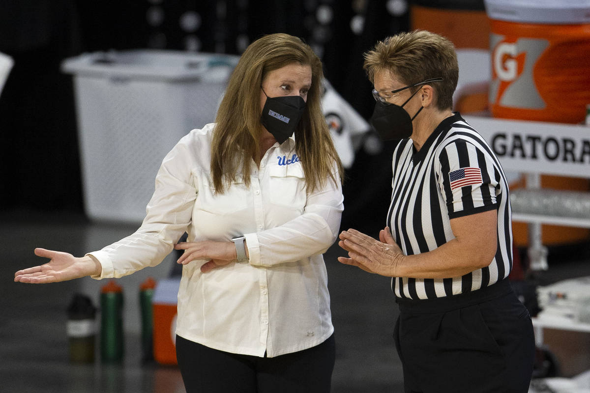 UCLA Bruins head coach Cori Close speaks with a referee during the first half of an NCAA colleg ...