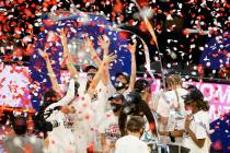 The Stanford Cardinal celebrate after winning the championship NCAA college basketball game at ...