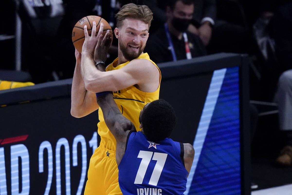 Brooklyn Nets guard Kyrie Irving guards Indiana Pacers forward Domantas Sabonis during the firs ...