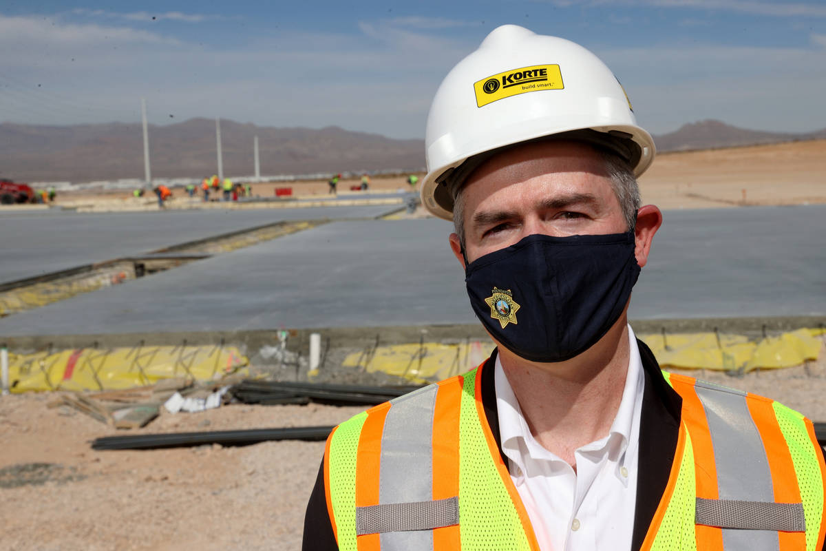 Tom Kovach, executive director of Las Vegas Metropolitan Police Department Foundation, talks to ...