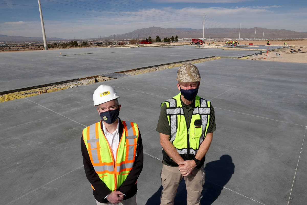 Tom Kovach, executive director of Las Vegas Metropolitan Police Department Foundation, left, an ...