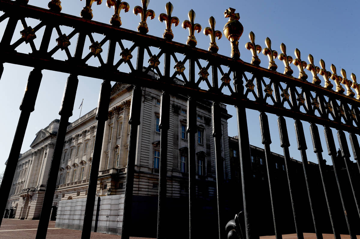 A view of Buckingham Palace, in London, Tuesday, March 9, 2021. Britain's royal family is absor ...