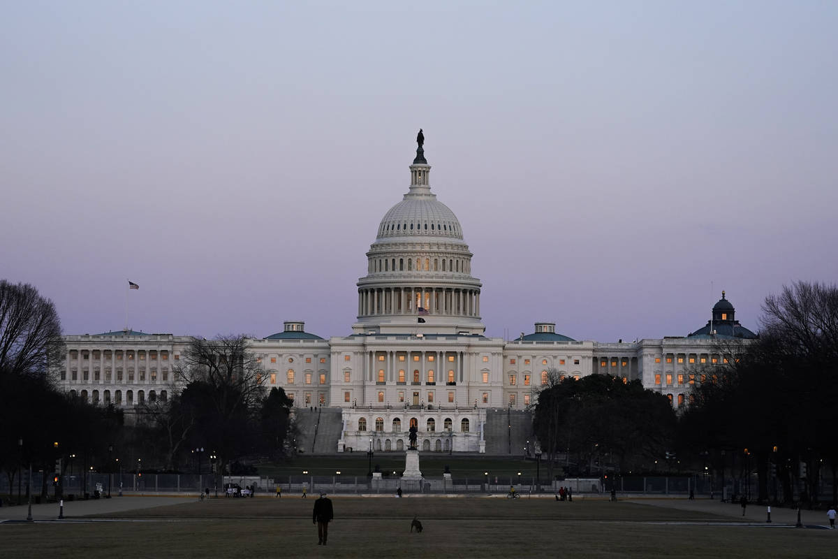 The U.S. Capitol building is shown after sunset Thursday, March 4, 2021, in Washington. (AP Pho ...