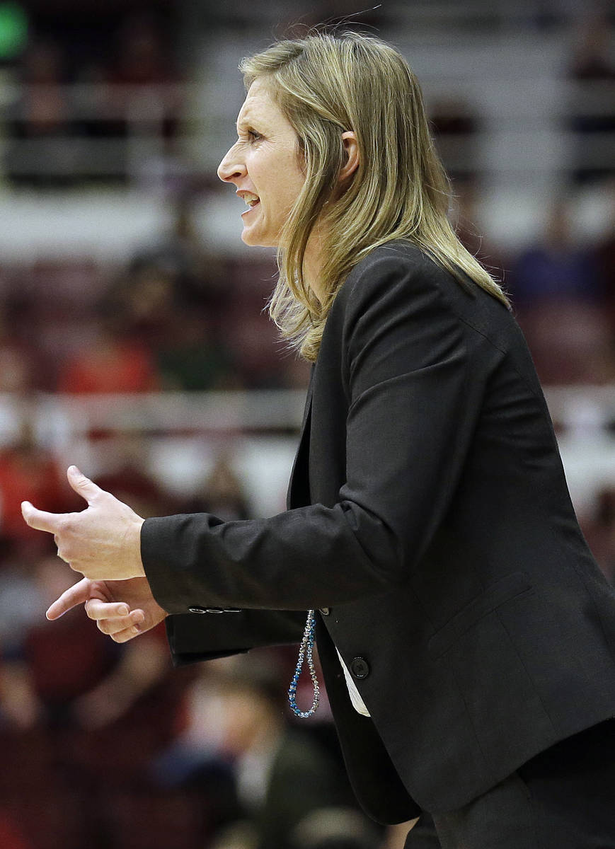 UC Davis head coach Jennifer Gross talks to her team from the sideline during the first half of ...