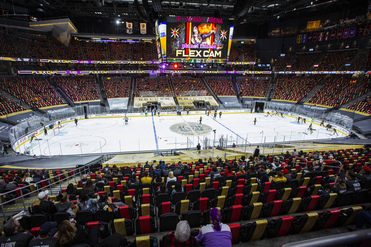 Fans are seen during the third period of the first Golden Knights game allowing spectators sinc ...
