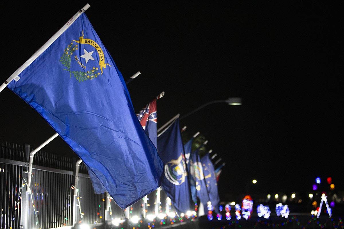 The Nevada state flag sits in line with a row of all of the flags of the fifty states at Glitte ...