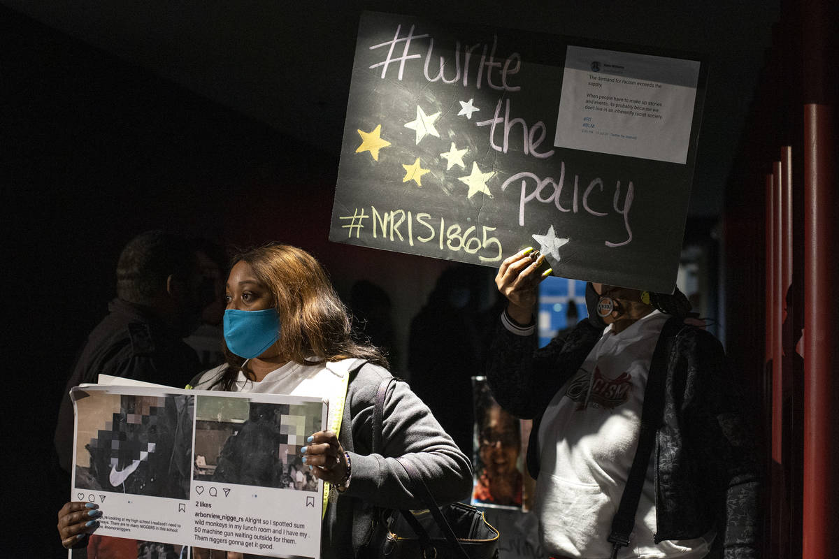 Jai Marshall, left, and Akiko Cooks, demonstrate as part of group No Racism in Schools #1865, d ...
