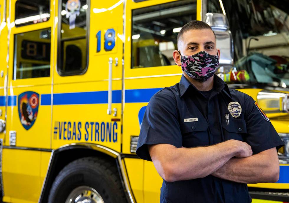 Clark County firefighter Andrew Molitor poses for a portrait at Fire Station 18 in Las Vegas on ...