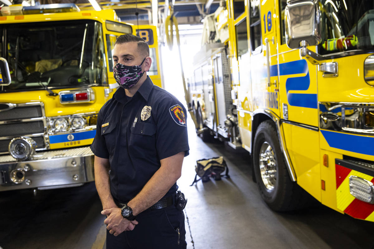 Clark County firefighter Andrew Molitor talks about COVID-19 safety protocols on the job at Fir ...