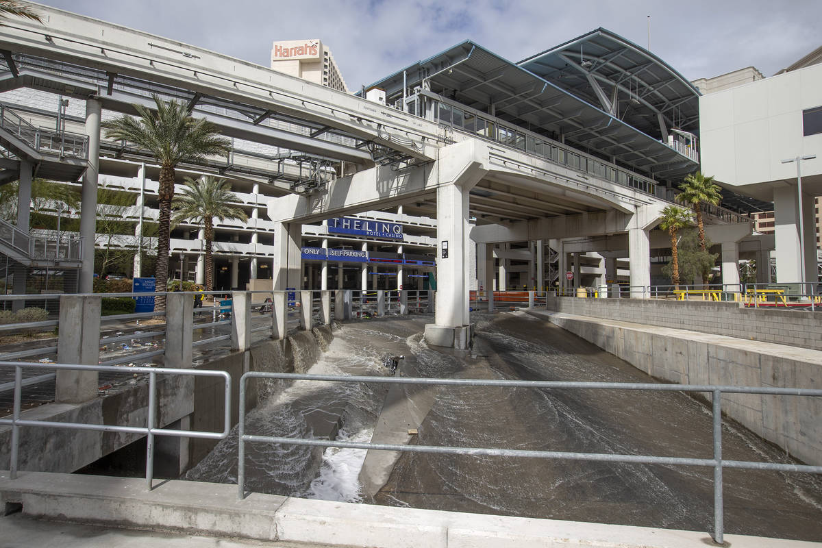 A flash flood at The LINQ parking garage rushes into a wash on Friday, March 12, 2021, in Las V ...