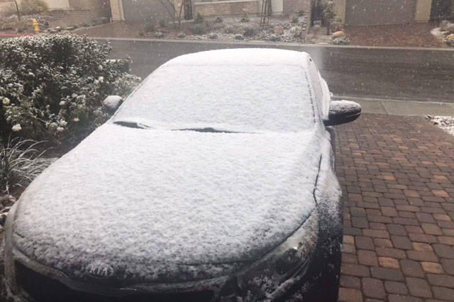 A car covered snow is seen in Summerlin, Friday, March 12, 2021. (Jim Prather/Las Vegas Review- ...