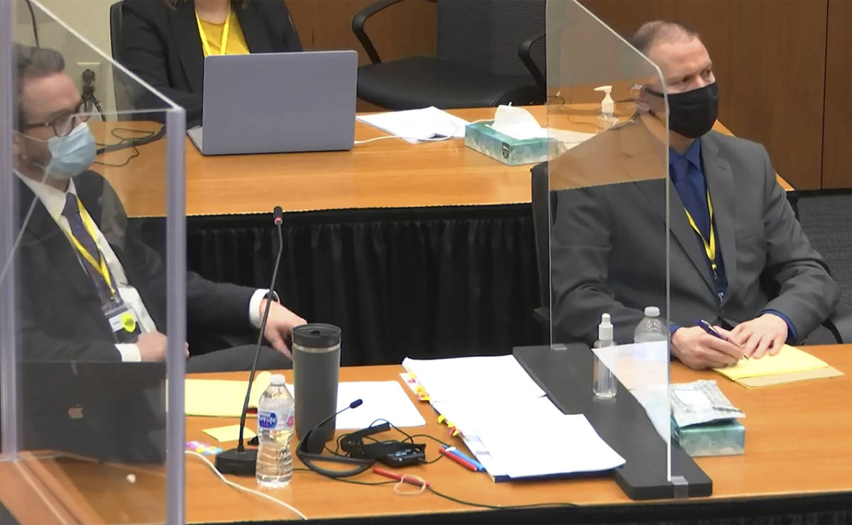 In this image taken from video, defense attorney Eric Nelson, left, and defendant former Minnea ...