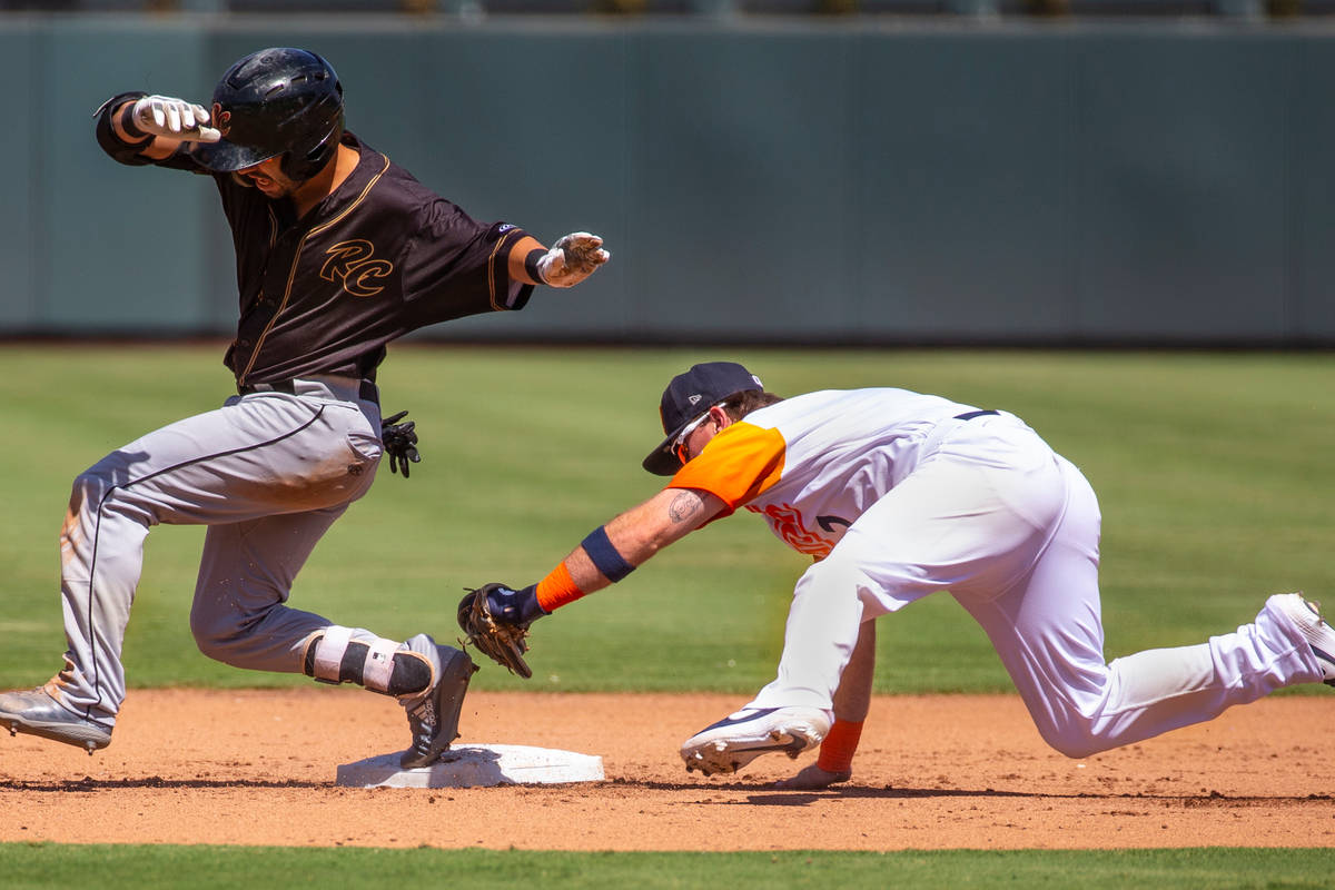 Sacramento River Cats second baseman Peter Maris (10, left) just beats a tag at second by Las V ...