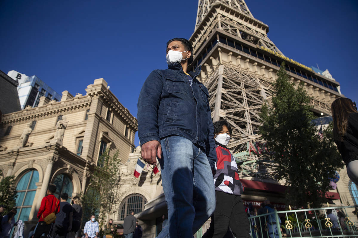 People visit the Strip in Las Vegas, on Saturday, March 13, 2021. (Erik Verduzco / Las Vegas Re ...