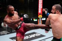 Leon Edwards of Jamaica kicks Bulal Muhammad in a welterweight fight during the UFC Fight Night ...