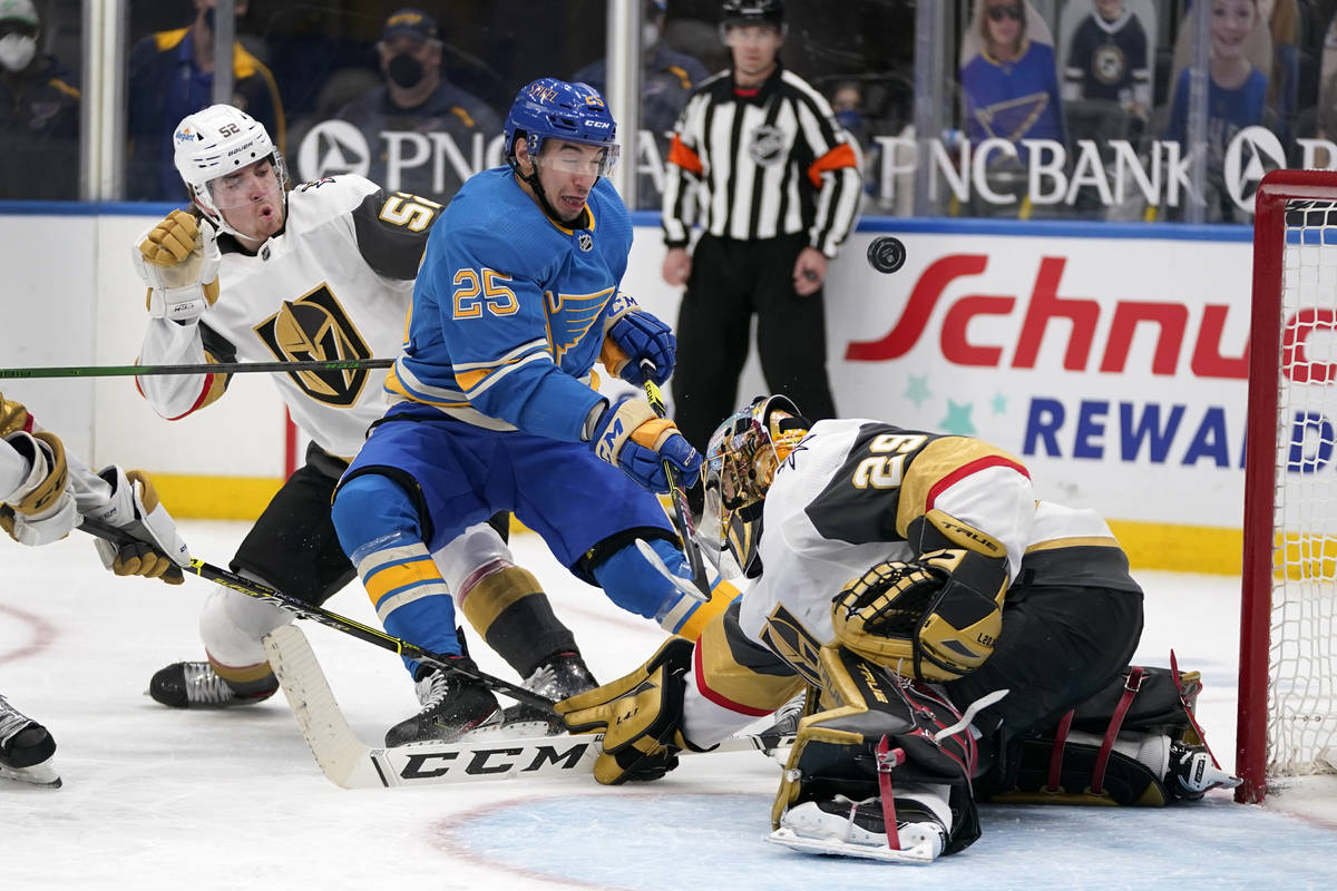 Vegas Golden Knights goaltender Marc-Andre Fleury (29) deflects a shot from St. Louis Blues' Jo ...