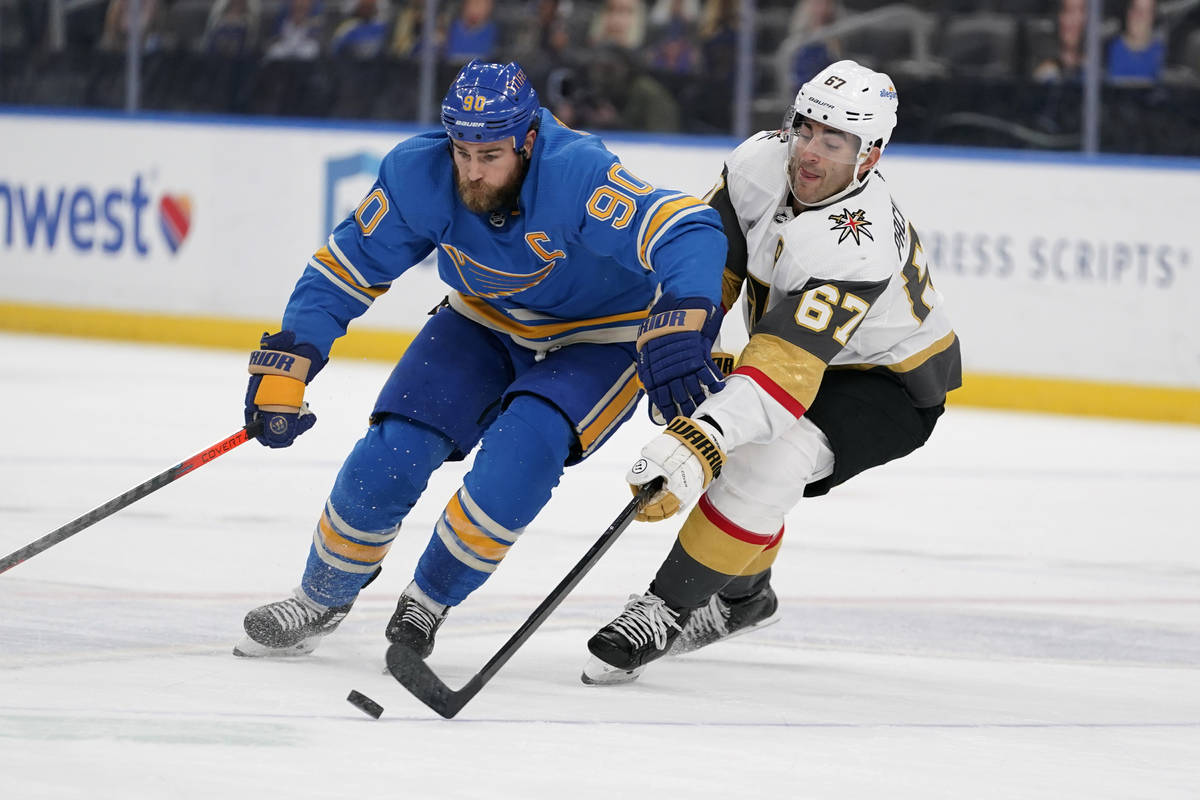St. Louis Blues' Ryan O'Reilly (90) and Vegas Golden Knights' Max Pacioretty (67) battle for a ...