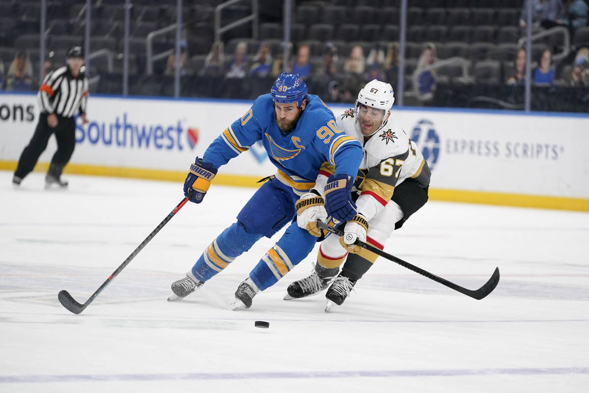 St. Louis Blues' Ryan O'Reilly (90) and Vegas Golden Knights' Max Pacioretty (67) battle for a ...