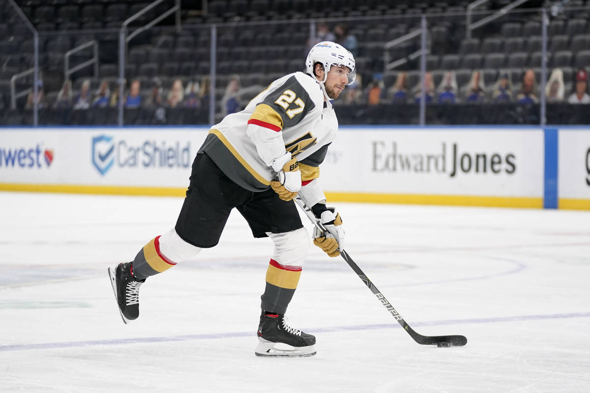 Vegas Golden Knights' Shea Theodore shoots during the third period of an NHL hockey game agains ...