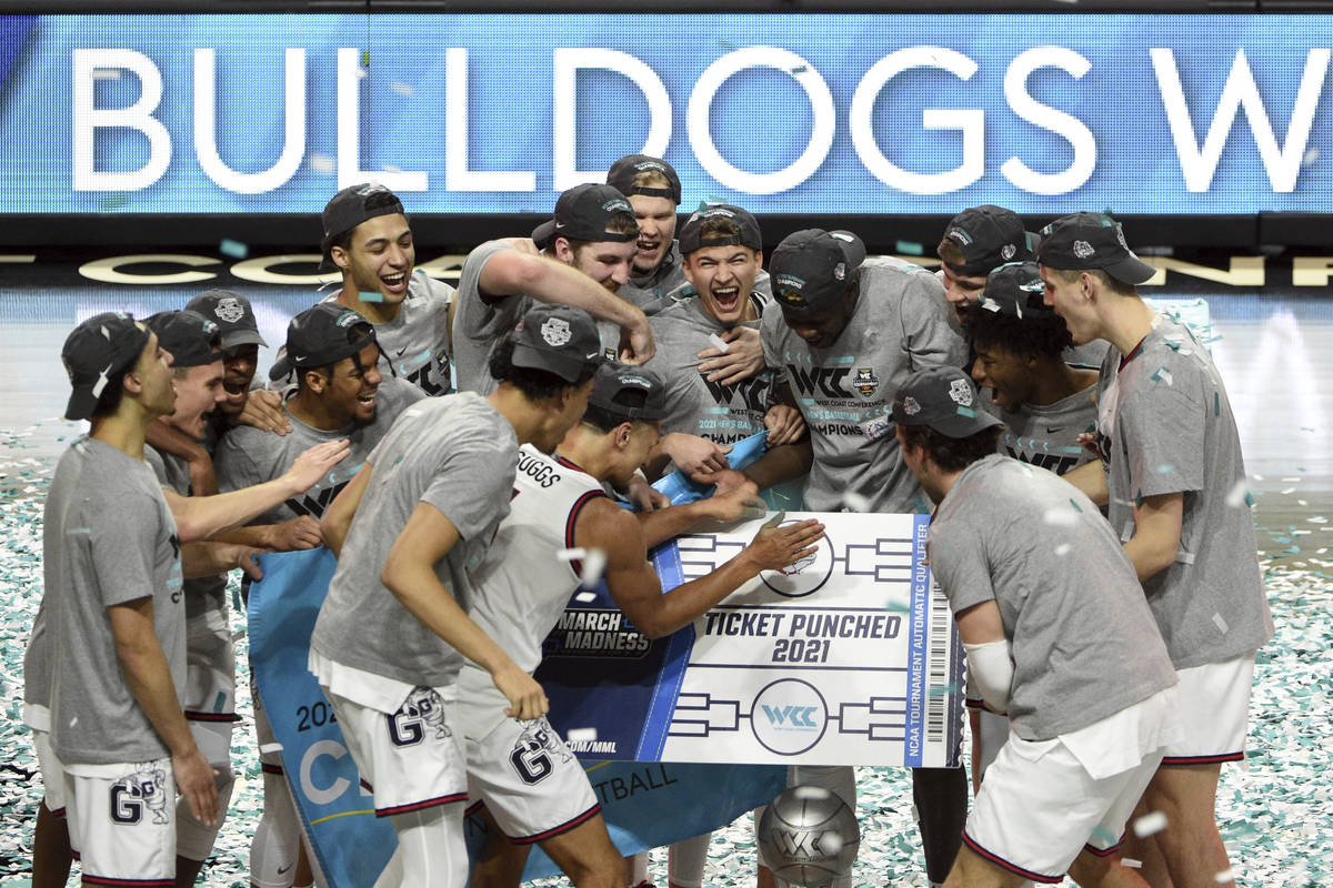 Gonzaga celebrates after they defeated BYU in an NCAA college basketball game for the West Coas ...