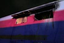 Smoke and flames were coming from a second-story window when Las Vegas firefighters arrived at ...