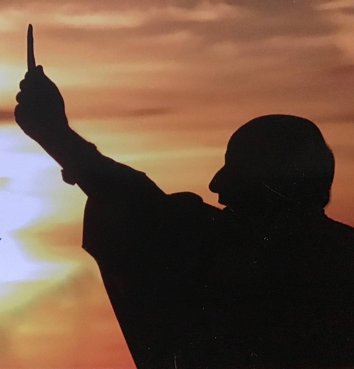 The Rev. William Kenny celebrates sunrise Easter Mass at Holy Spirit Catholic Church several ye ...