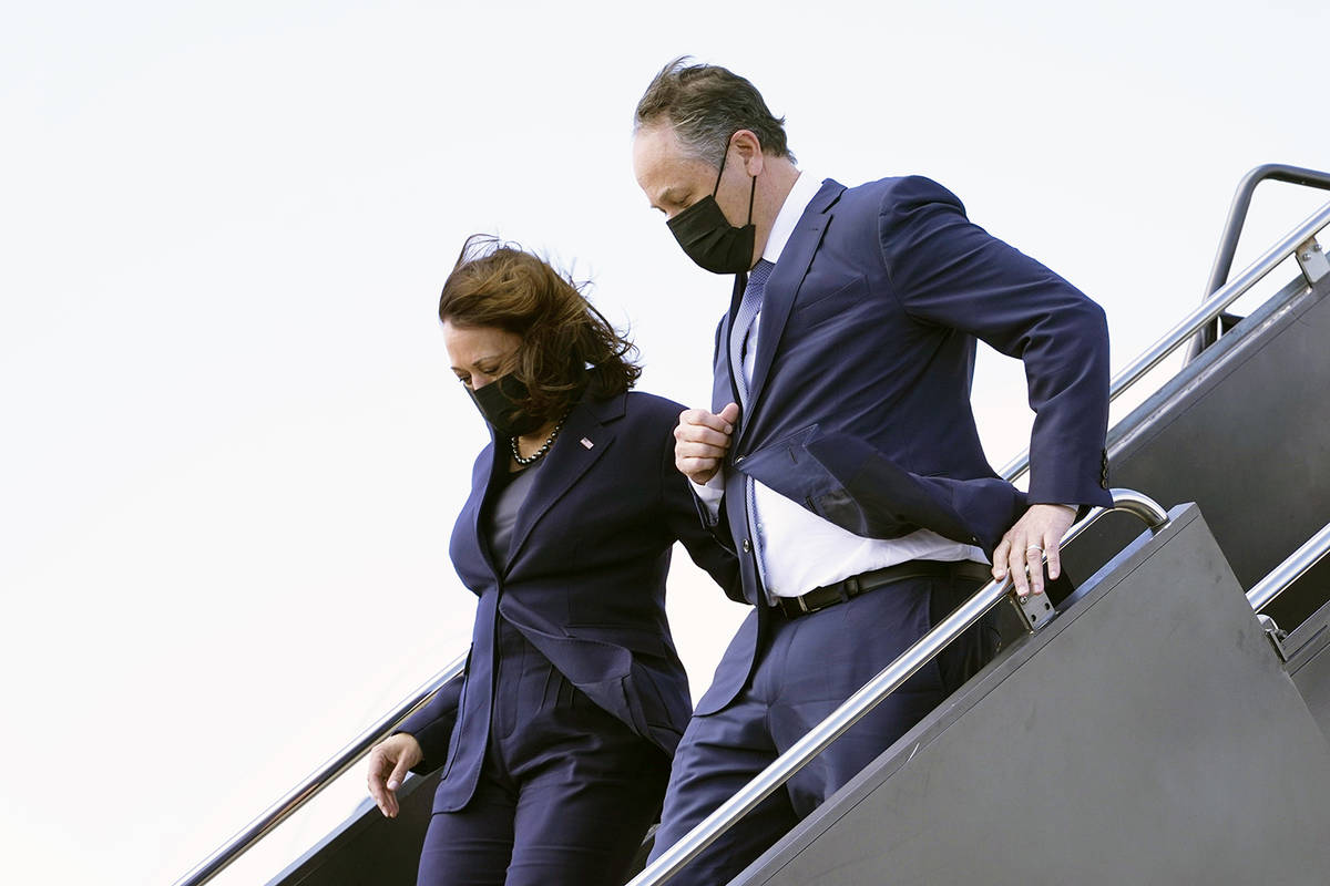 Vice President Kamala Harris and her husband, Doug Emhoff, arrive in Las Vegas, Monday, March 1 ...
