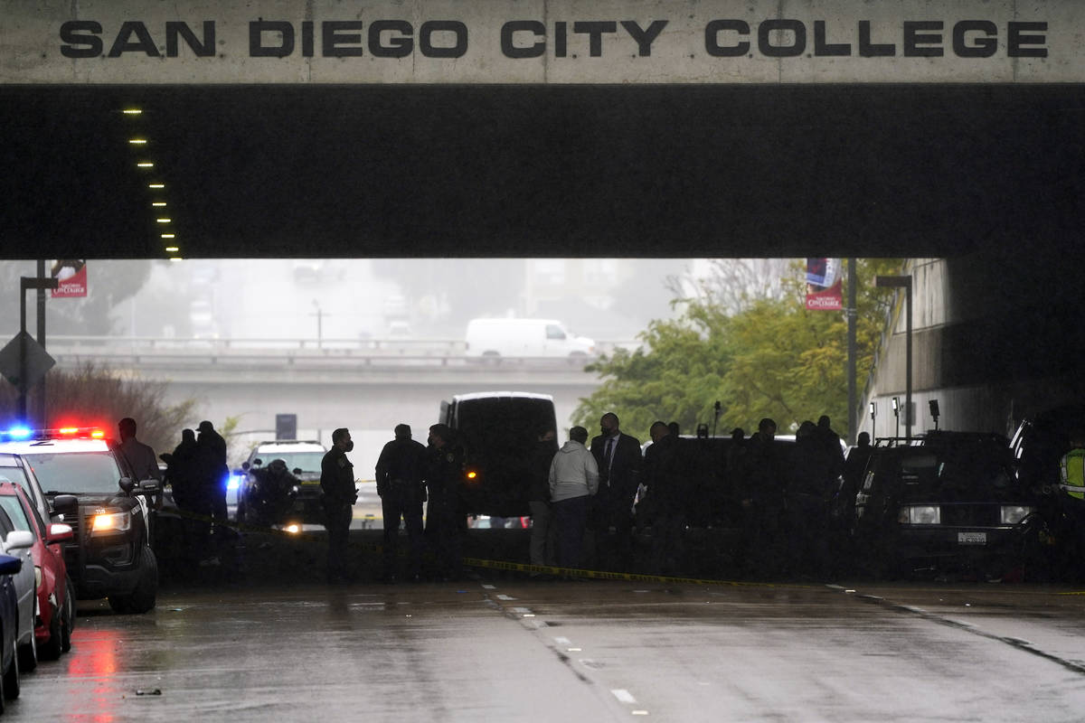 Emergency crews work at the scene of a deadly accident Monday, March 15, 2021, in San Diego. A ...
