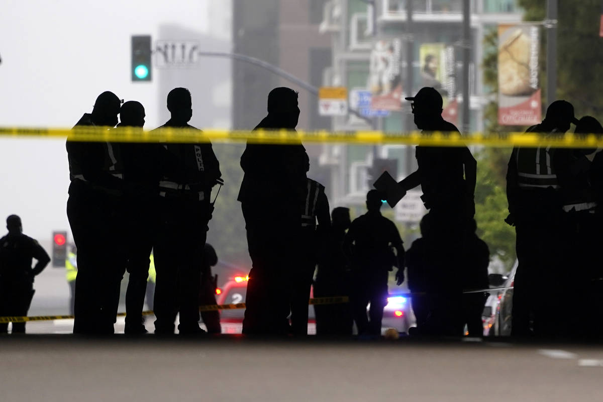Emergency crews work at the scene of a deadly accident Monday, March 15, 2021, in San Diego. A ...