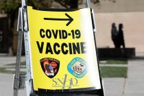 People come to Cashman Center to get vaccinated in Las Vegas, Friday, March 5, 2021. (Chitose S ...