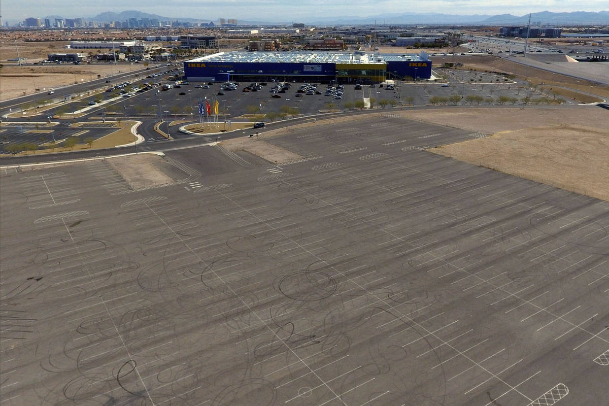 A swath of land where Ashley Furniture will set out to build a big store at Sunset Road just ea ...