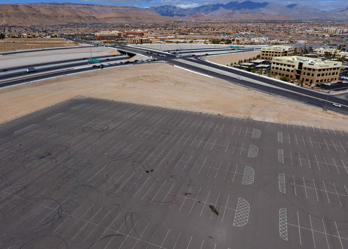 A swathe of land where Ashley Furniture will set out to build a big store at Sunset Road just e ...